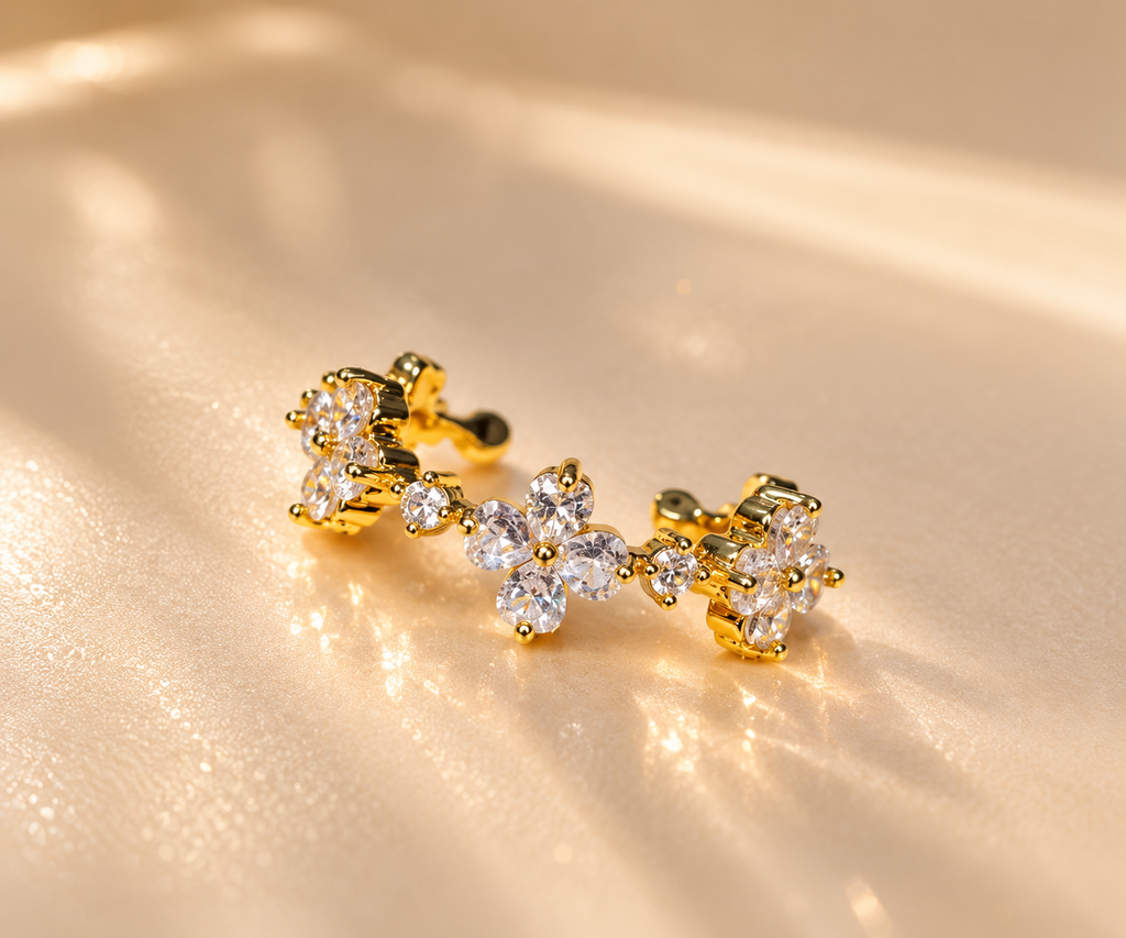 Gold-plated floral ring with clear decorative accents